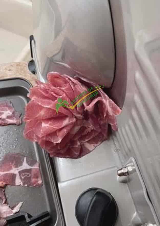 Slicing Meat With Ostba Meat Slicer While Reviewing