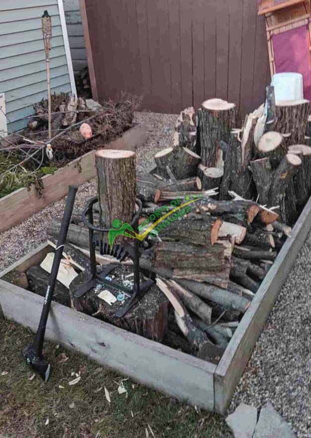 Splitting Logs Using Kindling Cracker Xl Manual Firewood Splitter In Budget