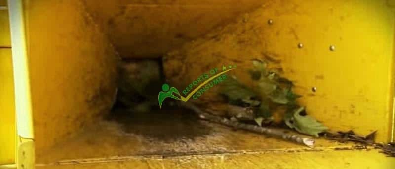 Close View Of Leaves And Barks Inside The Wood Chipper