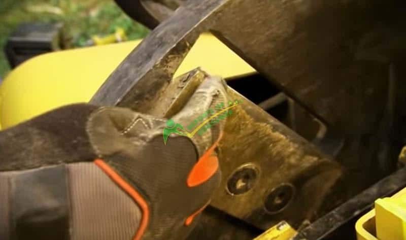 Pulling Out The Blades Of A Wood Chipper For Sharpening