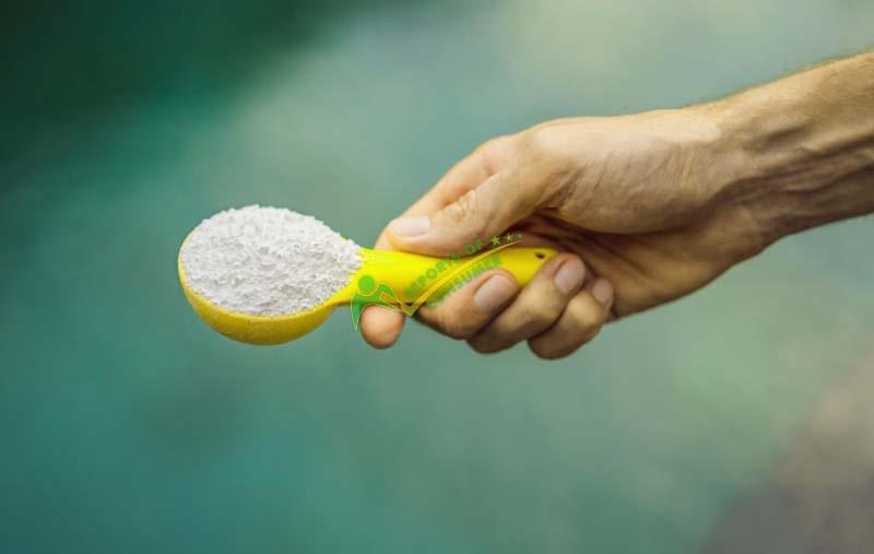 Adding Chlorine To Clean An Empty Above Ground Pool With Algae