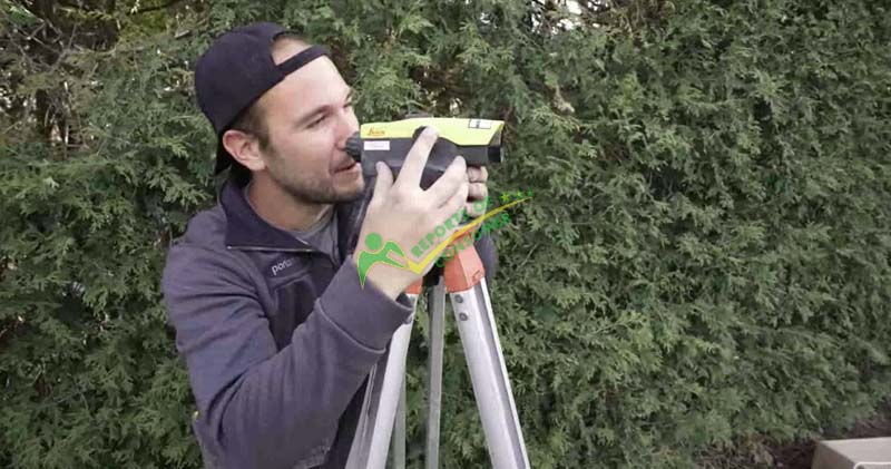 Checking The Level Of The Ground With Rotating Laser Level For Above Ground Pool Installation