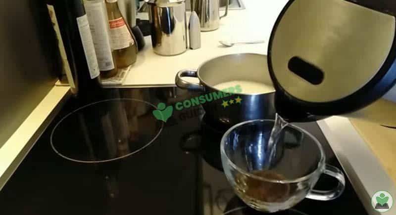 Mixing Hot Water And Instant Coffee