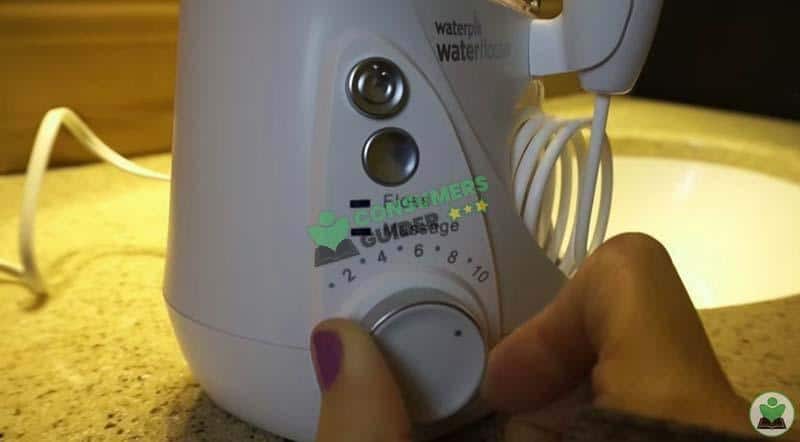 adjusting the water flosser pressure
